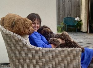 Photograph of People Fractional Director Lynn Morrison with two dogs