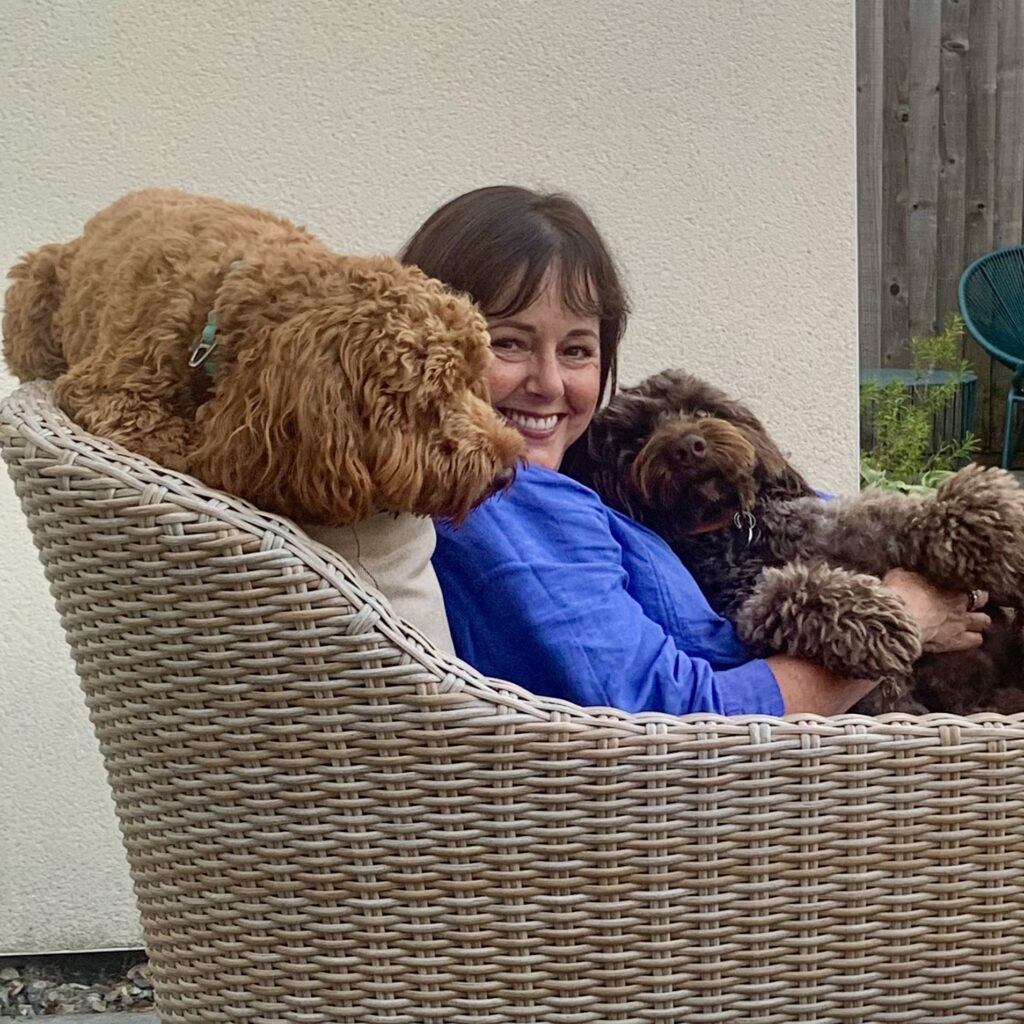Fractional People Director Lynn Morrison with two dogs
